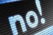 Der Text "no!" Pixeloptik, dargestellt durch leuchtende, blaue Ziffern auf einem dunklen Rasterhintergrund, der an einen digitalen Bildschirm erinnert.