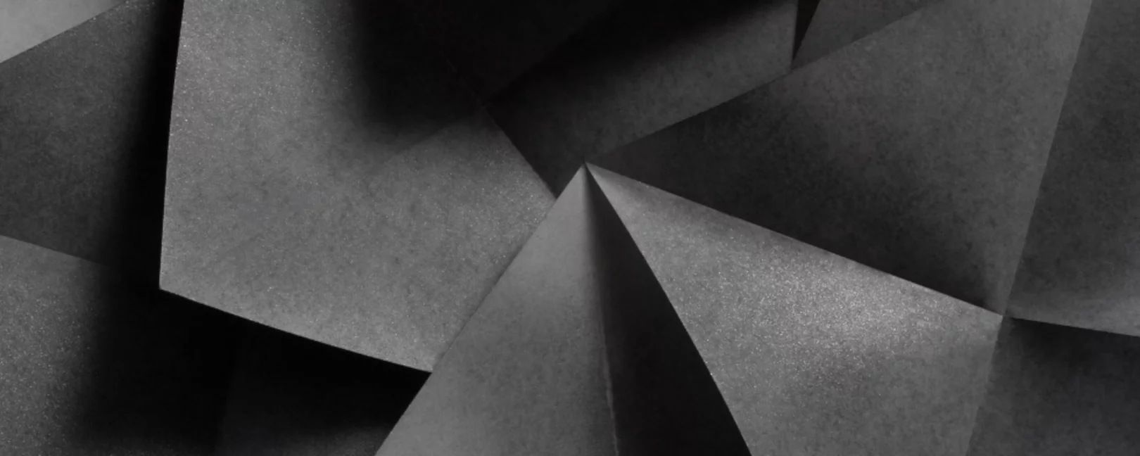 Macro image of geometric shapes of paper, three-dimensional effect, abstract background