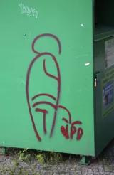 CIRCA APRIL 2014 - BERLIN: a comic figure pissing on the "NPD": Graffity against the right wing extremist party "NPD". CIRCA APRIL 2014 - BERLIN: a comic figure pissing on the "NPD": Graffity against the right wing extremist party "NPD".